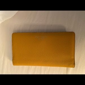 small spencer slim leather bifold wallet
KATE SPADE NEW YORK